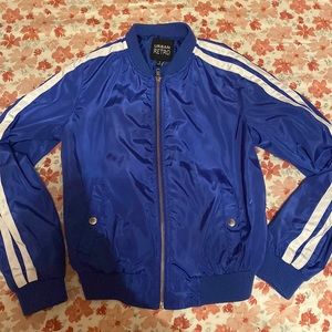 this is an urban retro sweater. it is small and dark blue.